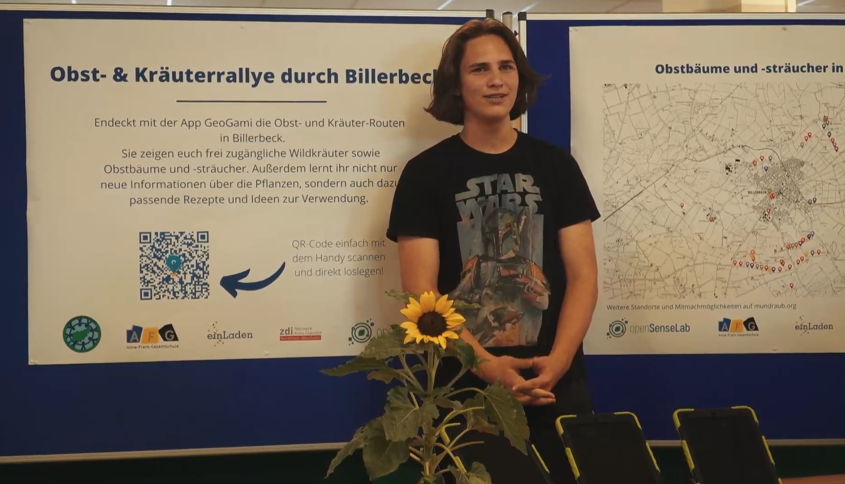 Ein Schüler der Anne-Frank-Gesamtschule stellt das Projekt der Kräuterrallye vor.