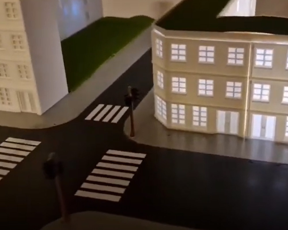 Ein Modell einer Stadt mit Zebrastreifen.