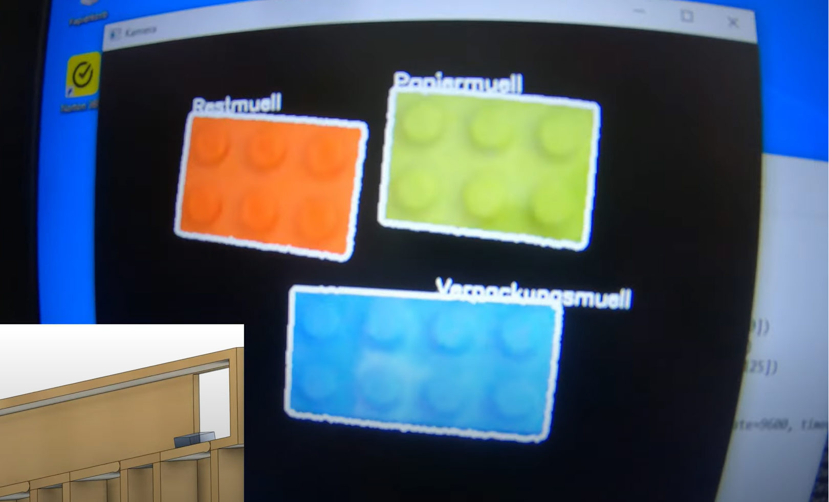 Auf dem Computermonitor wird ein Recyclingleitfaden mit Kategorien für verschiedene Abfallarten angezeigt.